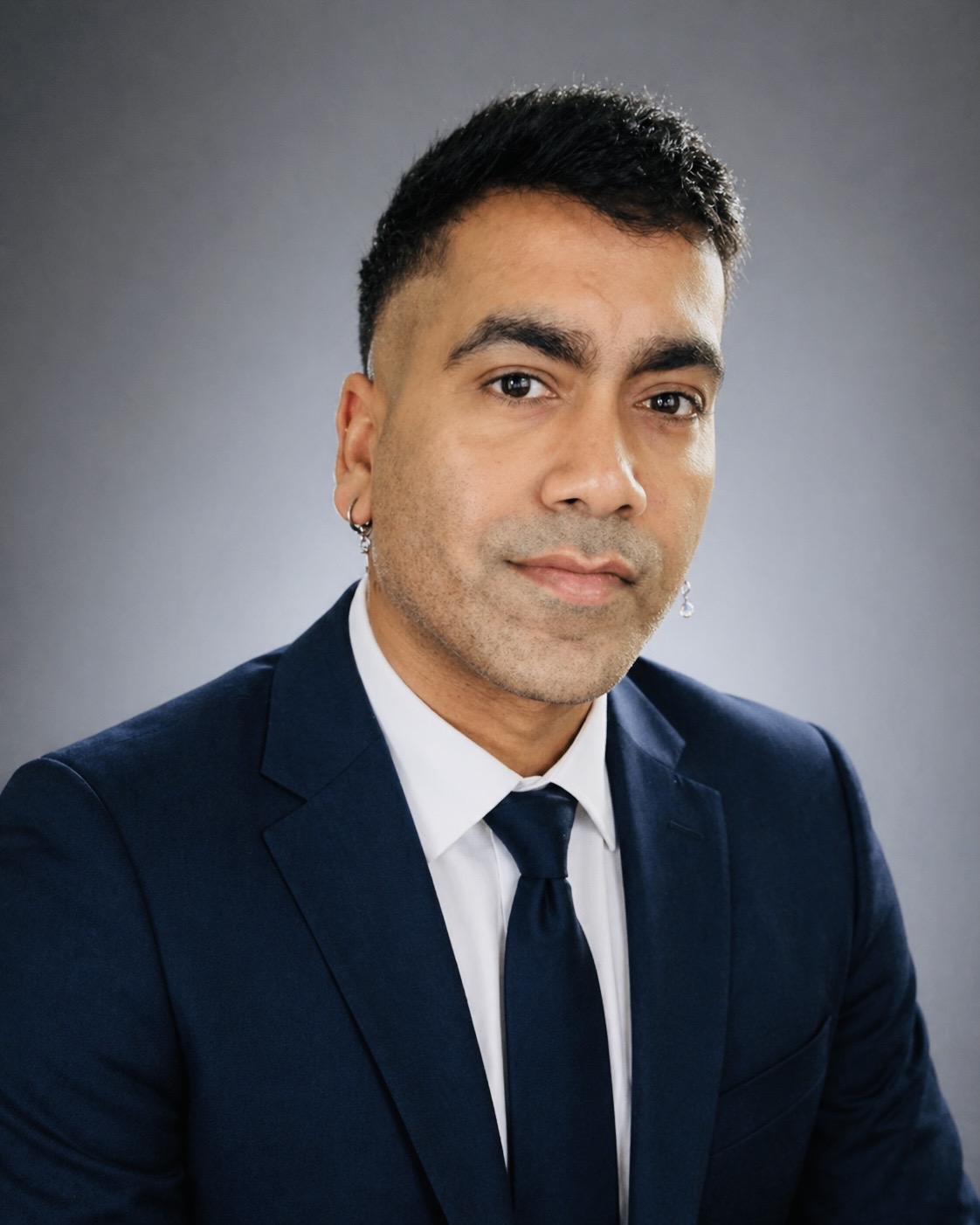 Vivek Sharma in a navy suit